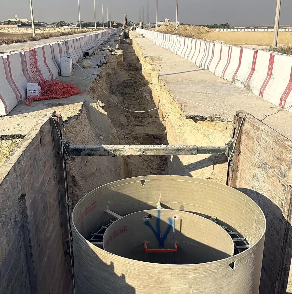 GRP manhole inside a shored excavation
