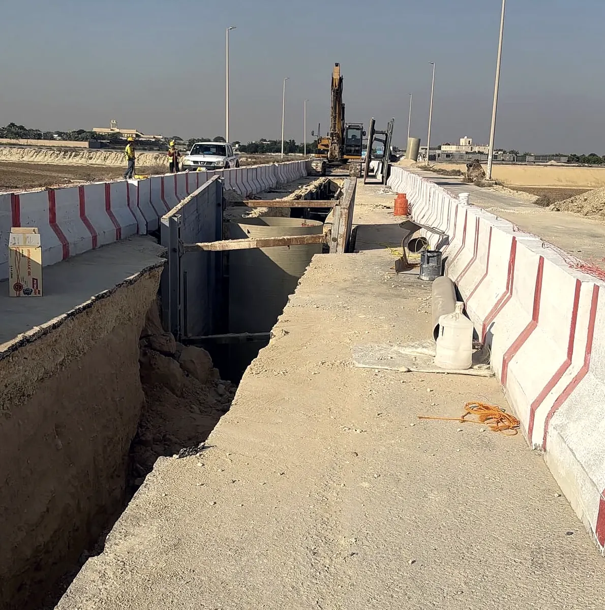 Sewer network: excavation, shoring and manhole installation