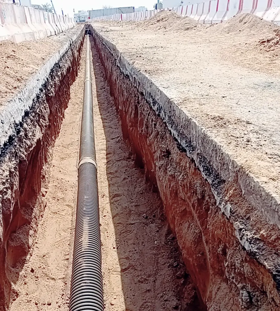 Laying corrugated pipe in Samtah, Jazan