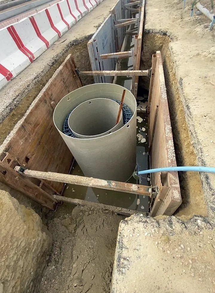 GRP manhole in a shored excavation in Safwa