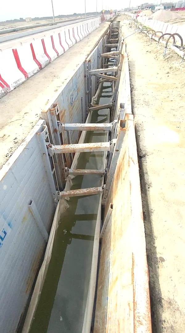 Trench boxes along the sewer line in Safwa
