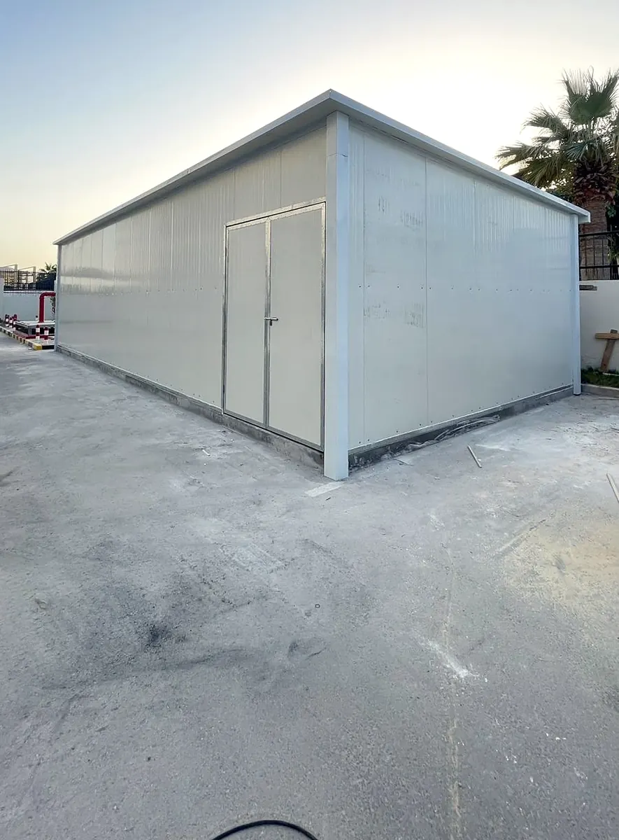 Insulated sandwich-panel building